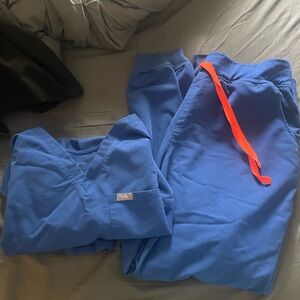 Figs Royal Blue Scrub Set with Bright Orange Accent